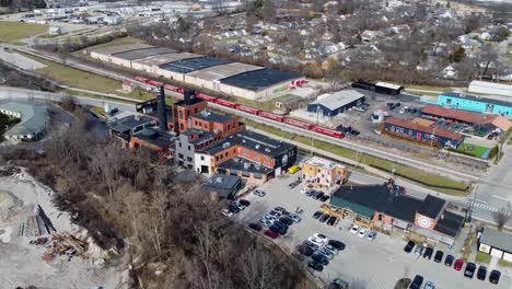 drone shot of the pepper distillery district in lexington, kentucky pulling out and panning right