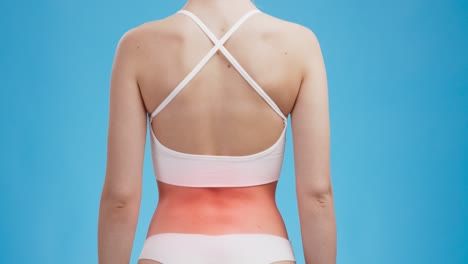 mujer con dolor de espalda