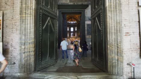 people inside the hagia sophia or ayasofya, turkey. aya sofya is a tourist attraction of istanbul. panorama of the old interior. concept of traveling and vacation in istanbul