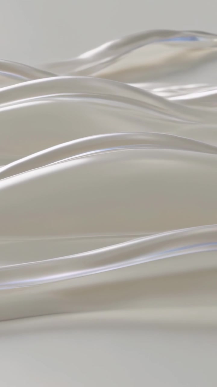 Vertical video: Play starting, clear ribbons sweeping across cream waves in studio, studying motion