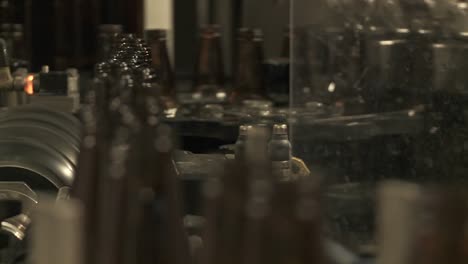 bottles zip along a conveyor belt in a bottling plant 3