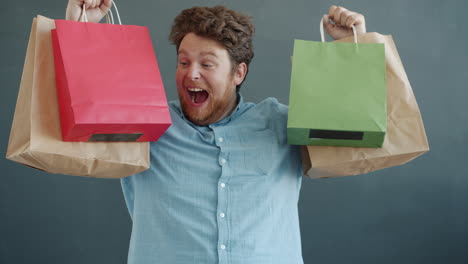 excited shopper with shopping bags