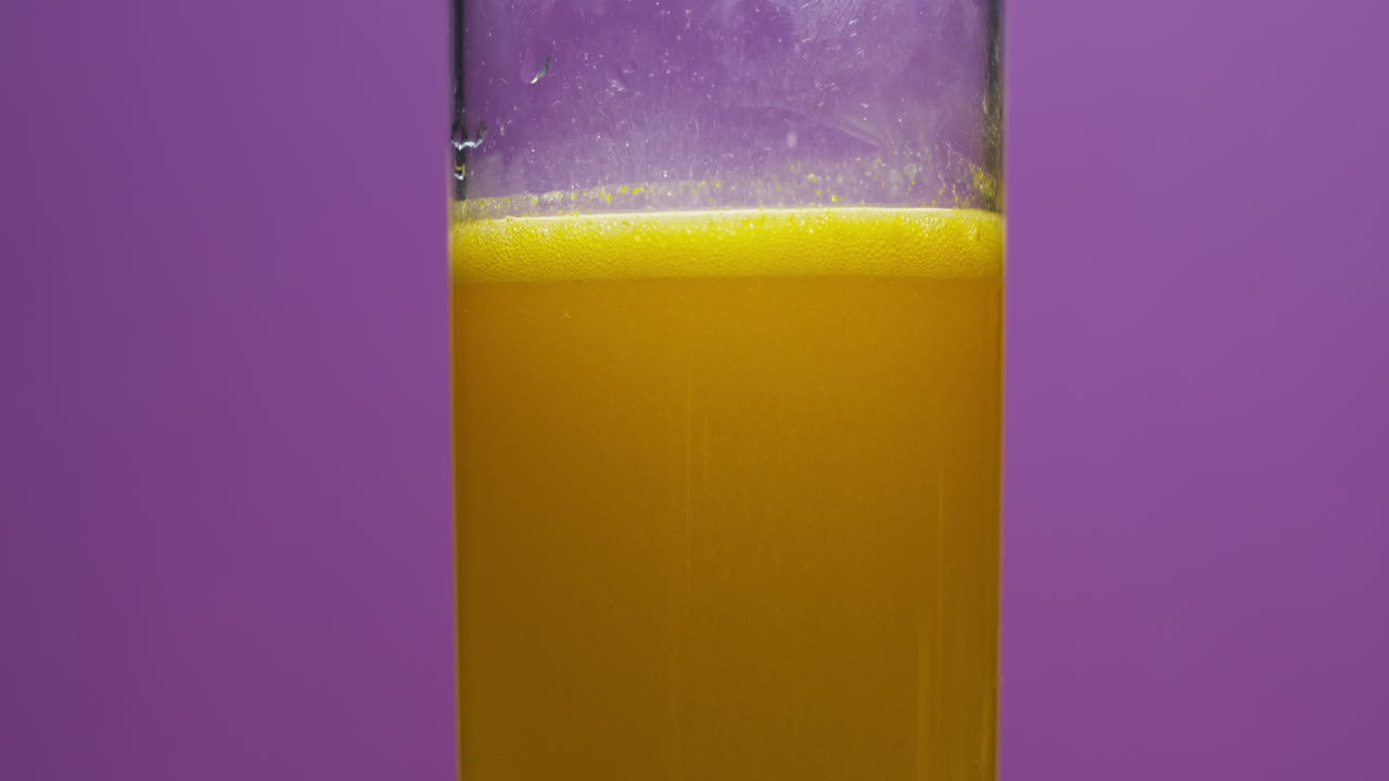 Effervescent tablet vitamin C nutritional supplements in glass with orange carbonated water.Aspirin antipyretic drugs.Vitamins C pills against flu, medicines. Healthy concept immune system High quality 4k footage