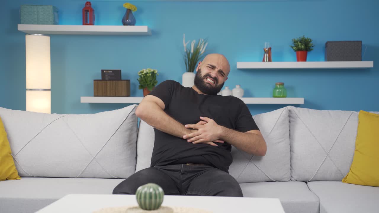 Man with stomachache.