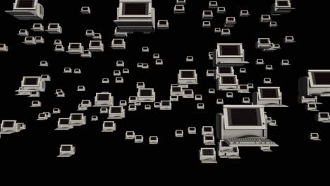 computadoras retro en un espacio vacío moviéndose lentamente más allá de la cámara con fondo negro