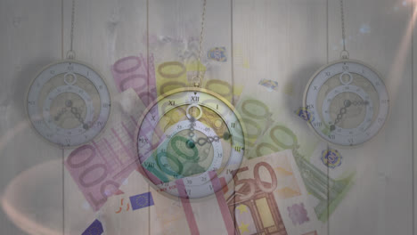 animation of clocks over banknotes