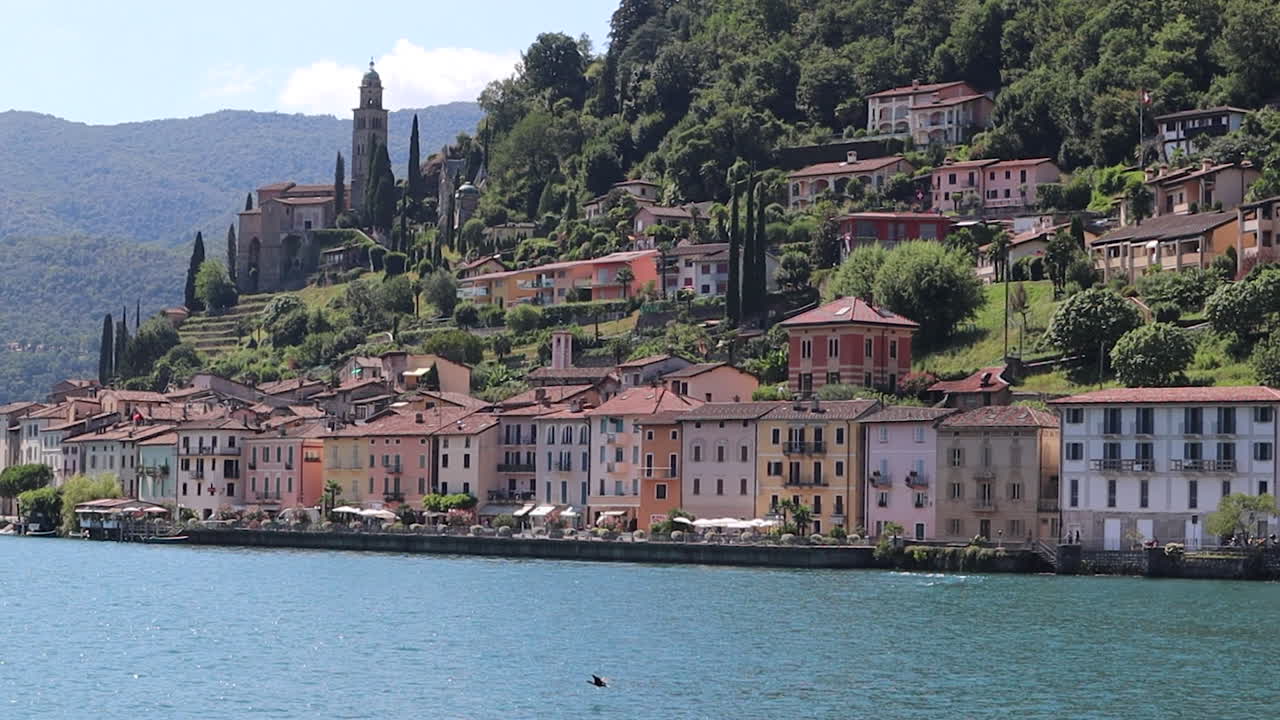 Cruising on Lake Lugano with a flock of seagull. Ticino Canton, Switzerland.