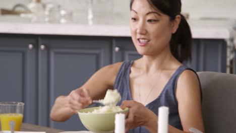 family eating meal at home together shot on r3d