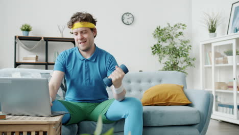 man doing a funny online workout at home