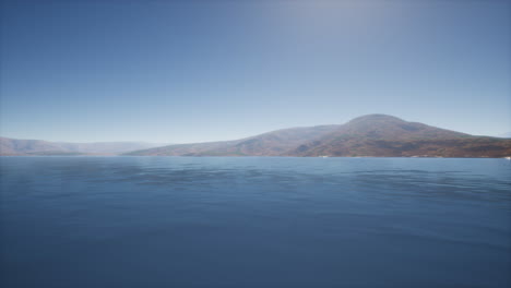 lake in hills on summer day