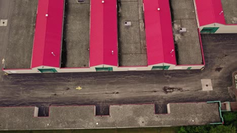 Aerial-of-a-rental-public-storage,-One-way-road-for-auto-vehicles-to-drive-to-your-storage-unit