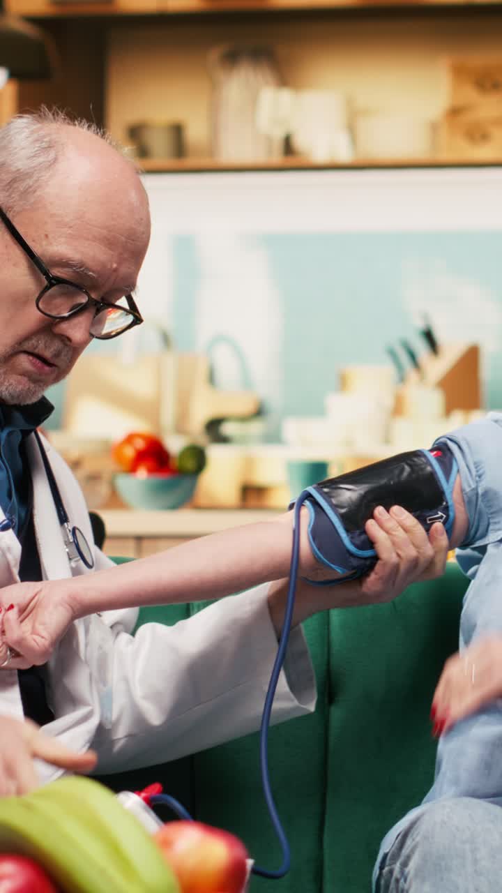 Vertical Video Doctor using electronic blood pressure device with cuff and pump