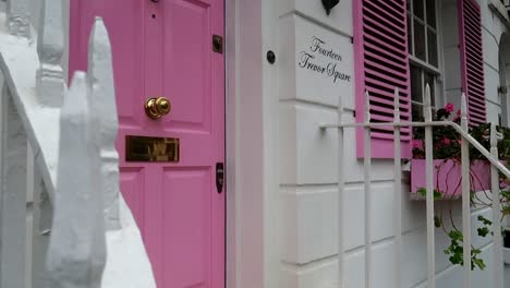 Attractive-entrance-pink-door-in-Fourteen-Trevor-Square