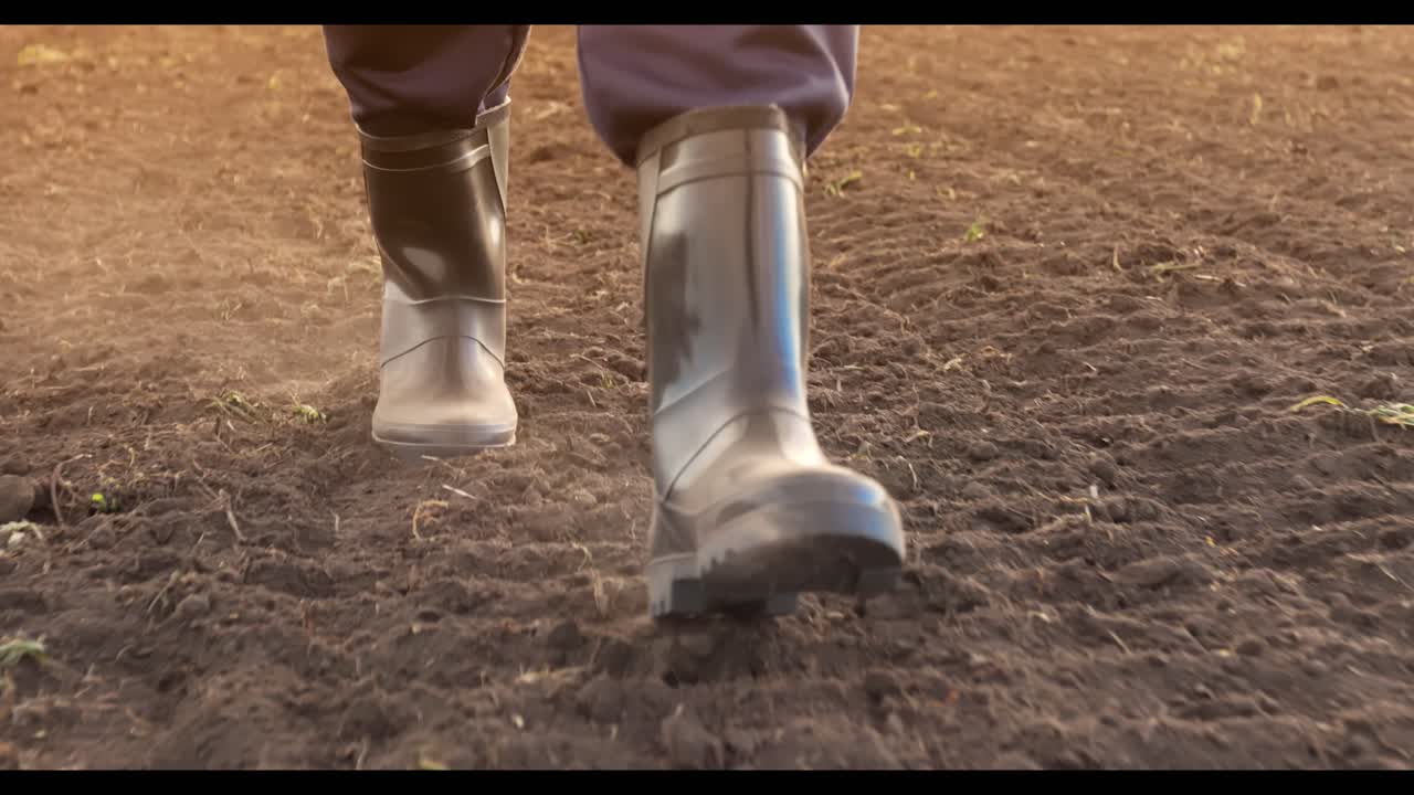 Farmer walking in a field