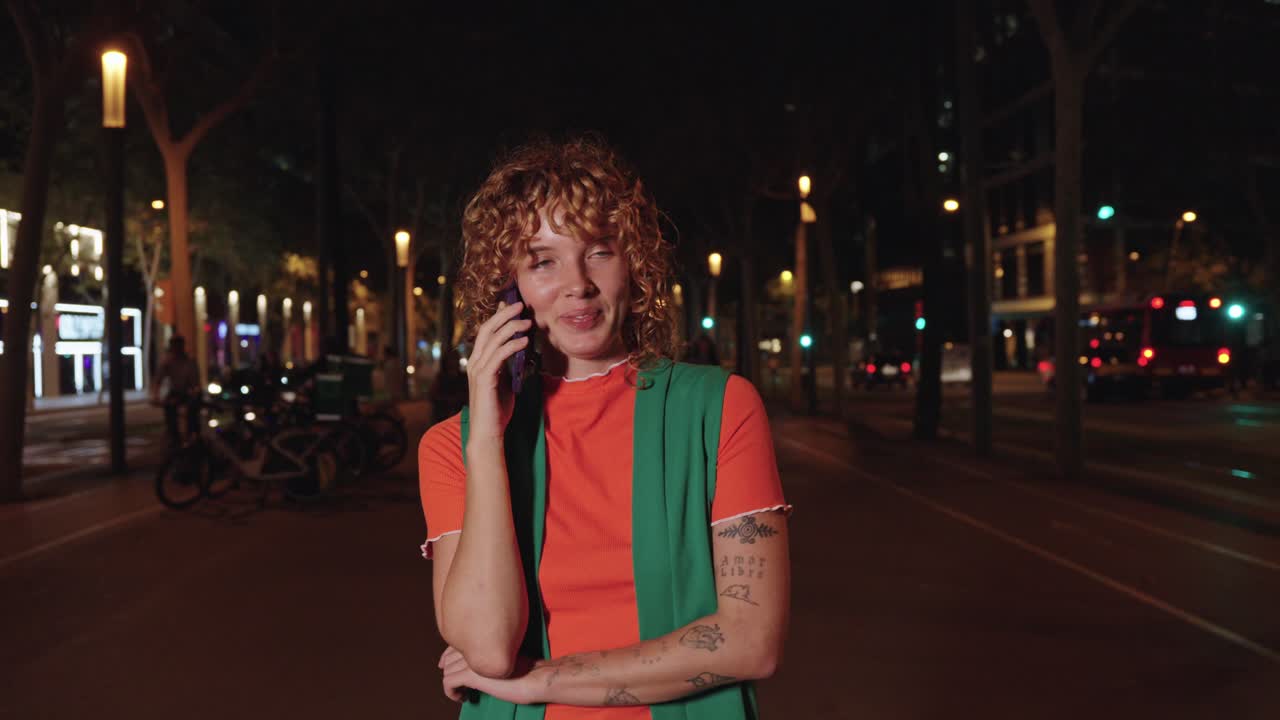 Woman on a phone call at night