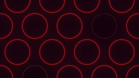 red neon circles pattern on black gradient