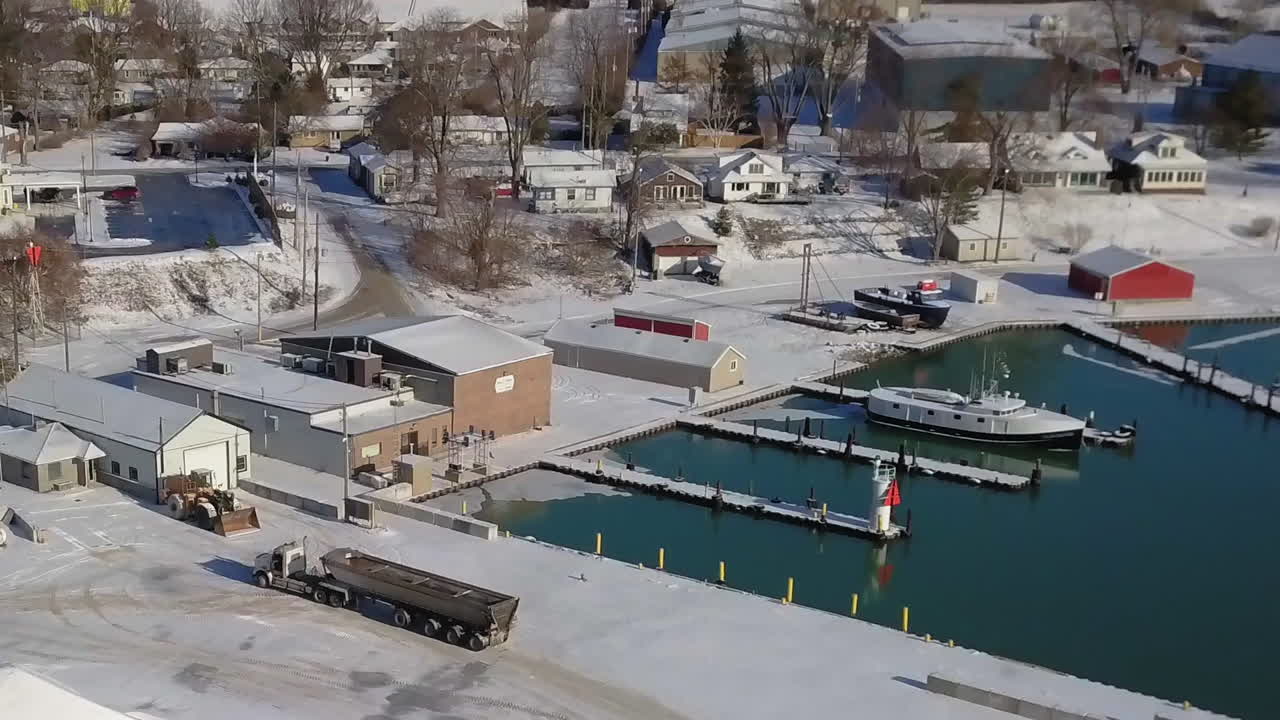 Above view of a parked lorry near the  emerald harbor in the winter