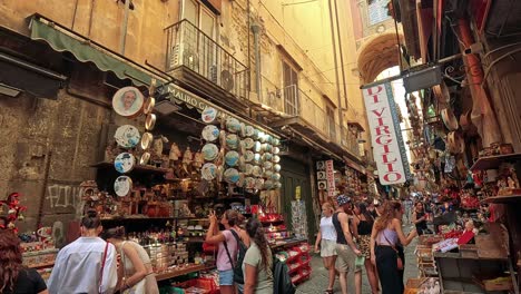 people explore vibrant street market in naples