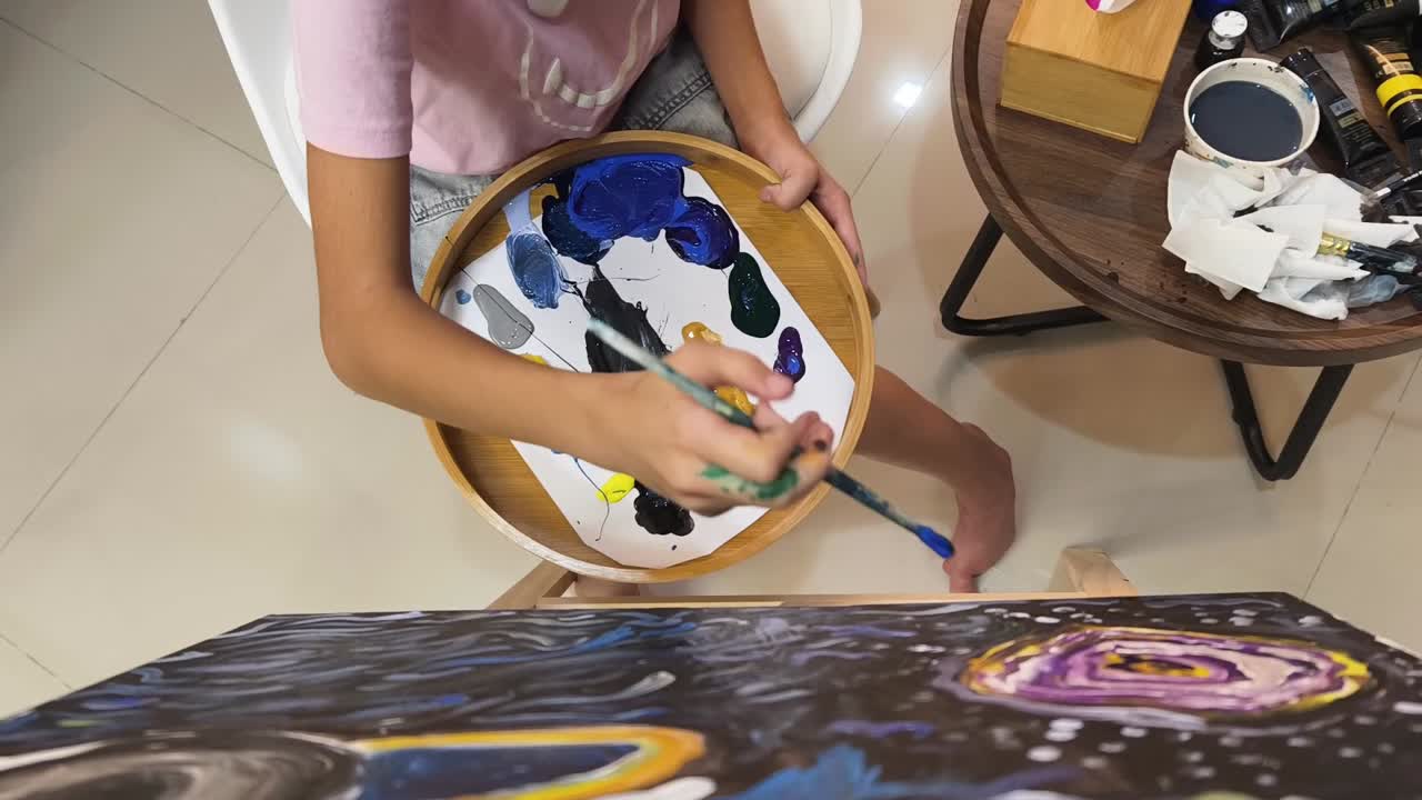 Young Artist Creating an Abstract Painting