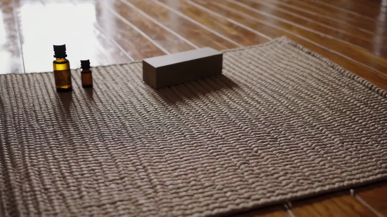 Yoga Mat with Accessories on Wooden Floor