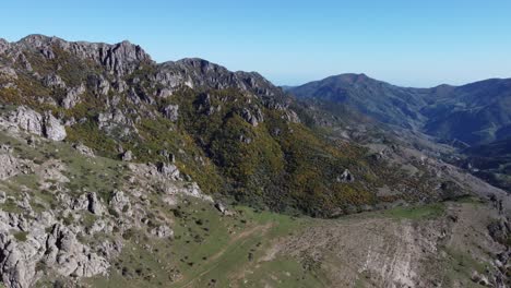 Blue-sky-aerial-over-rugged-Talysh-Mountains-of-Azerbaijan,-Asia