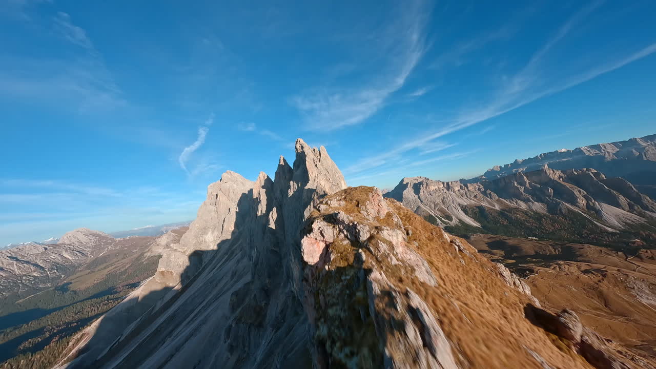 Thrilling FPV drone flight along rugged Seceda ridgeline, Puez-Geisler, Italy