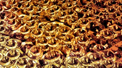 fondo abstracto en bucle con patrón líquido dorado brillante y ondulado en una superficie brillante y brillante. fluido azul viscoso como la superficie de papel dorado o vidrio brillante. hermoso telón de fondo festivo creativo.