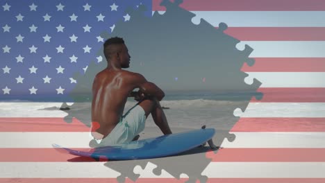 Animation-Von-Feuerwerk-Und-Puzzles-Mit-Amerikanischer-Flagge,-Die-Einen-Mann-Zeigen,-Der-Am-Strand-Sitzt