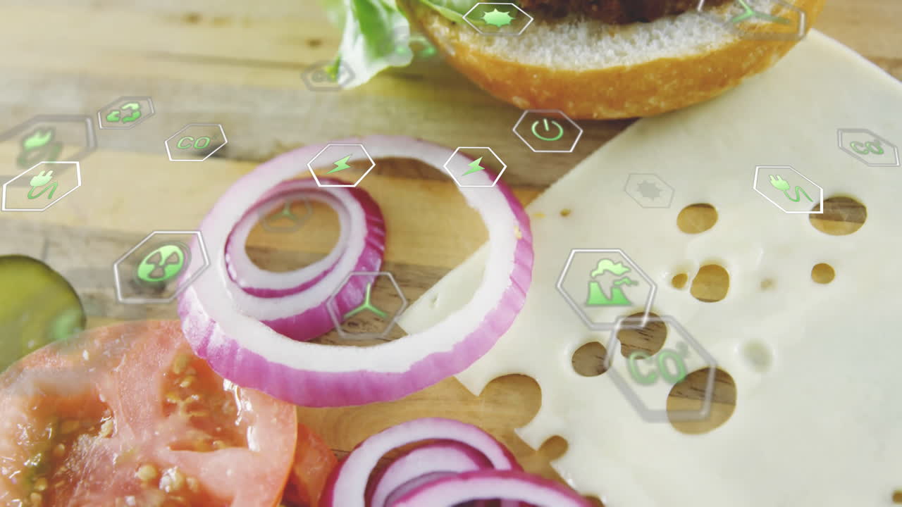 Digital icons overlay on sliced vegetables and cheese on wooden board