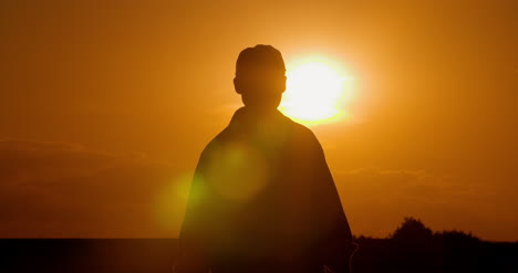 farmer using digital tablet at farm against sunset 9