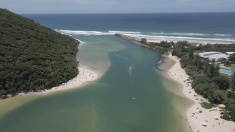 mouth of tallebudgera creek flowing to the pacific ocean