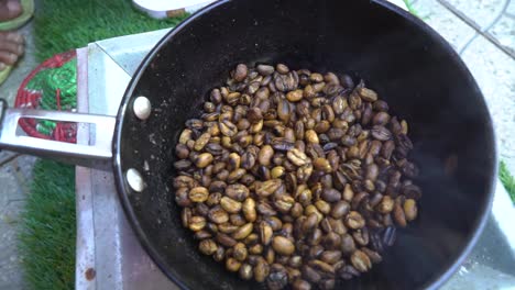 roasting ethiopian coffee during a coffee ceremony in addis ababa, ethiopia-1