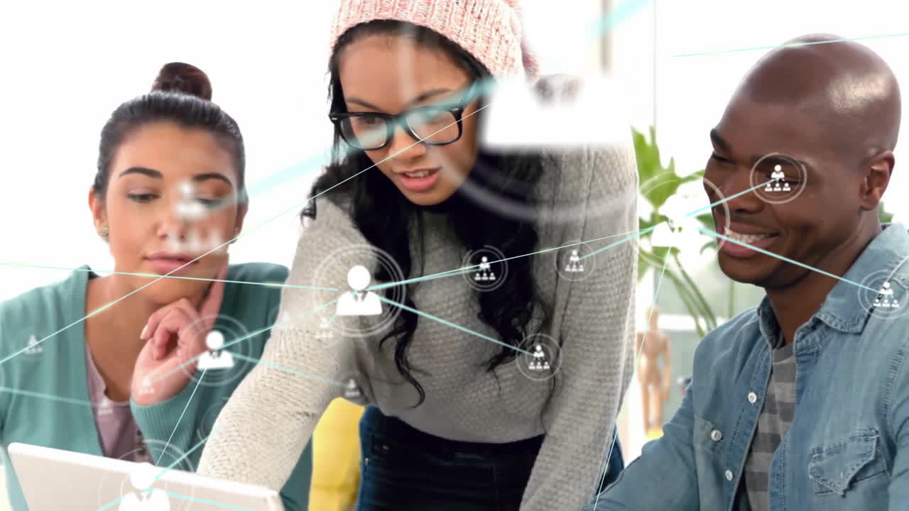 Animation of network of connections with icons over diverse business people in office