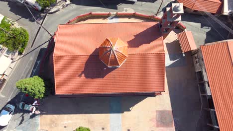 Aerial-drone-footage-of-traditional-countryside-hilltop-village-Farmakas,-in-Nicosia,-Cyprus