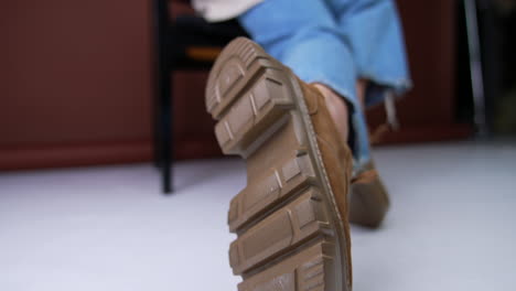 close-up of brown suede shoes