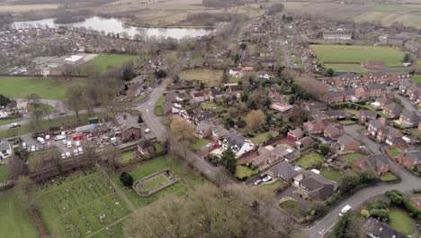 aerial view above uk british small residential countryside farming village