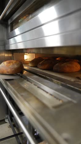 fresh bread baking in a commercial oven