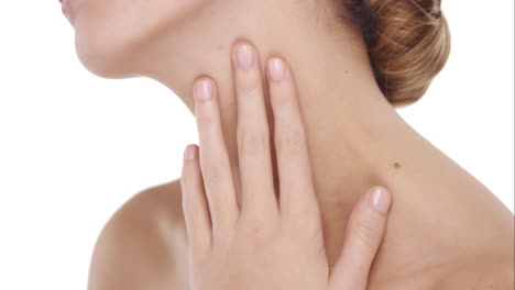 beauty portrait of woman touching beautiful face in slow motion skincare concept on a white background