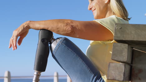 disabled woman relaxing in the beach 4k