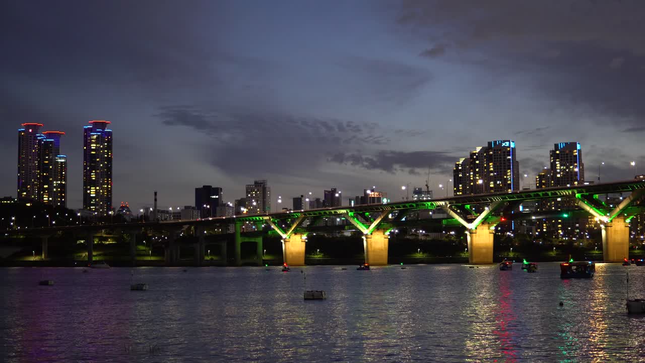 Colorful Night View Of Cheongdam Bridge Over Han River And Seoul Cityscape In South Korea. Wide Shot