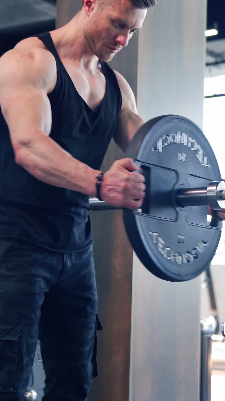 Fitness man training in fitness center