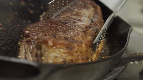 frying meat steak inside frying pan