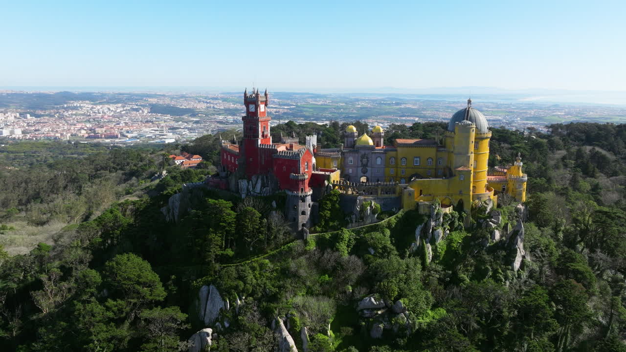 Palace of Pena surrounded by forest aerial