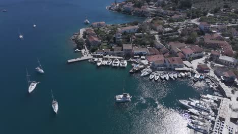 aerial view of a greek coastal town and marina