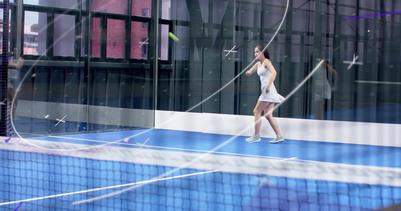 Woman on padel court spotting friend entering and exchanging high-fives marking practice end