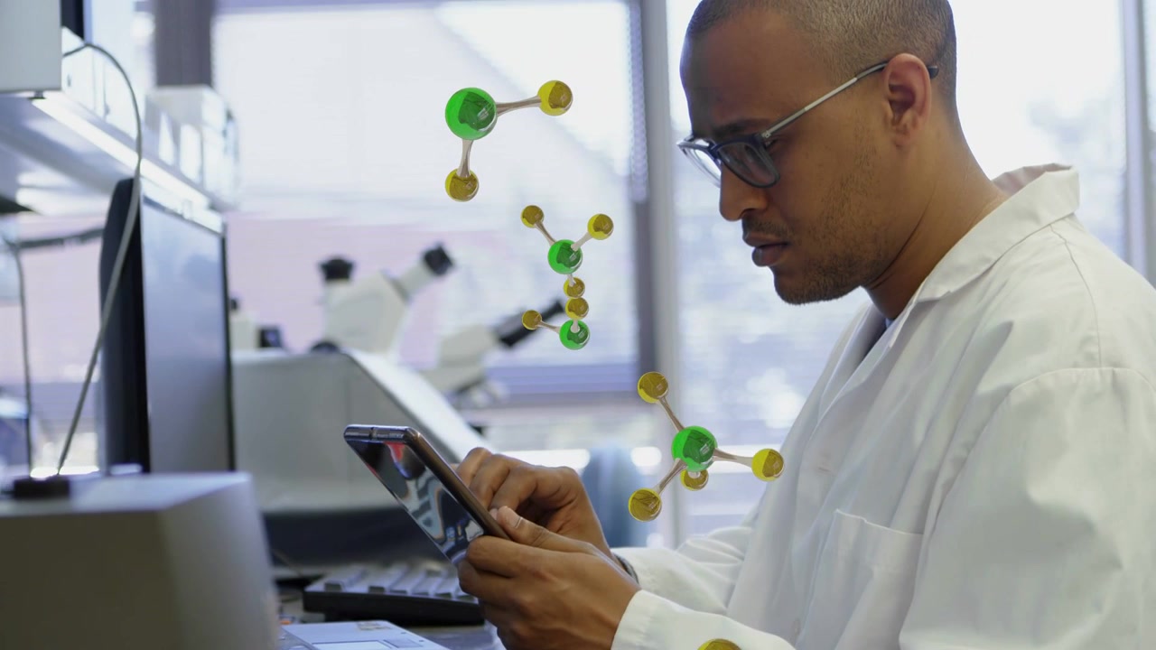 Male researcher tapping tablet and summoning floating molecular models for laboratory analysis