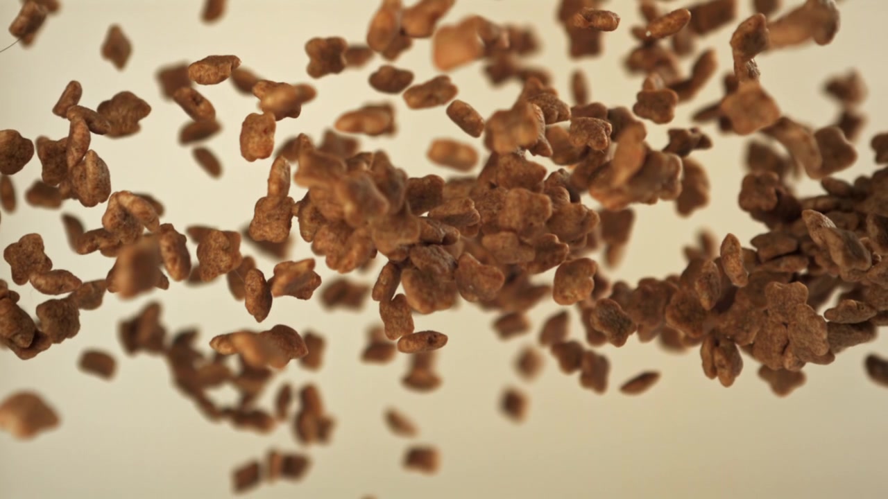 Delicious Chocolate Star Cereal Pieces Falling in Slow Motion