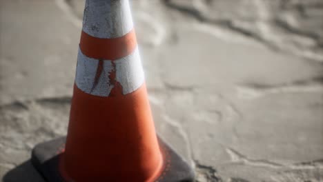 orange and white striped traffic cone