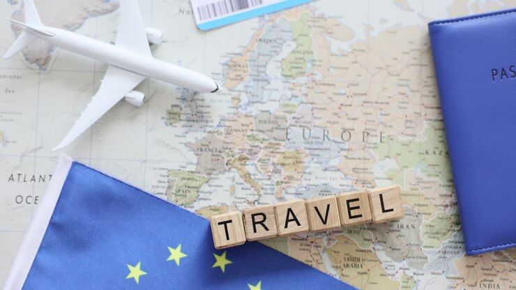 European Travel Concept with Map, Passport, and Airplane