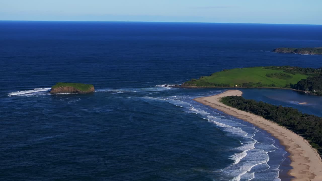 Mystics waves surfing break Stack Rangoon Island Killalea Minnamurra beach Illawarra State Park aerial drone Shellharbour Wollongong Australia NSW South Coast Shell Cove sunny blue sky circle right